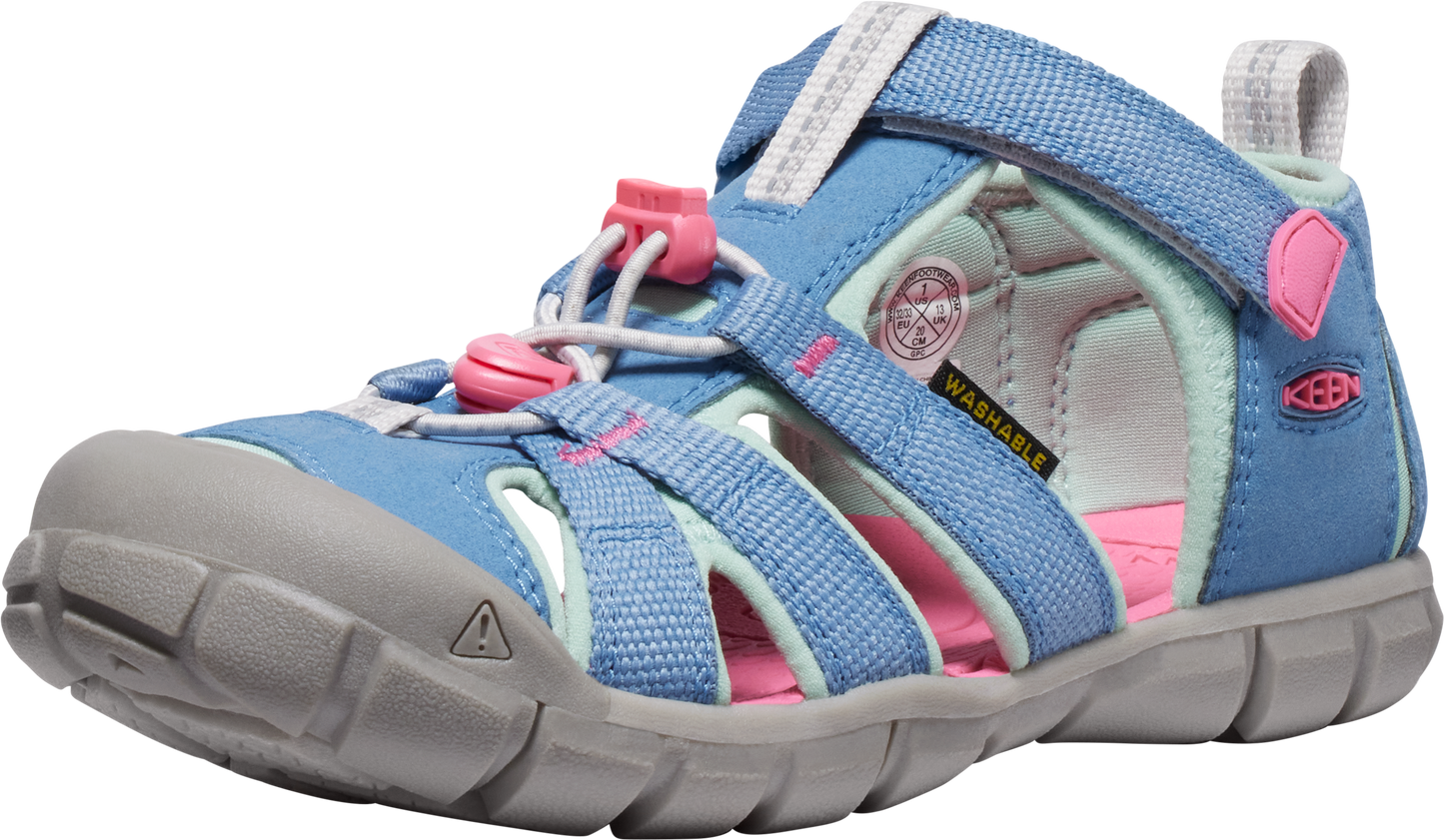 Blue sandal with pink accents, open toe and velcro ankle strap.