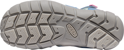 Bottom of a sandal with a gray sole, featuring a pattern of rectangular treads.