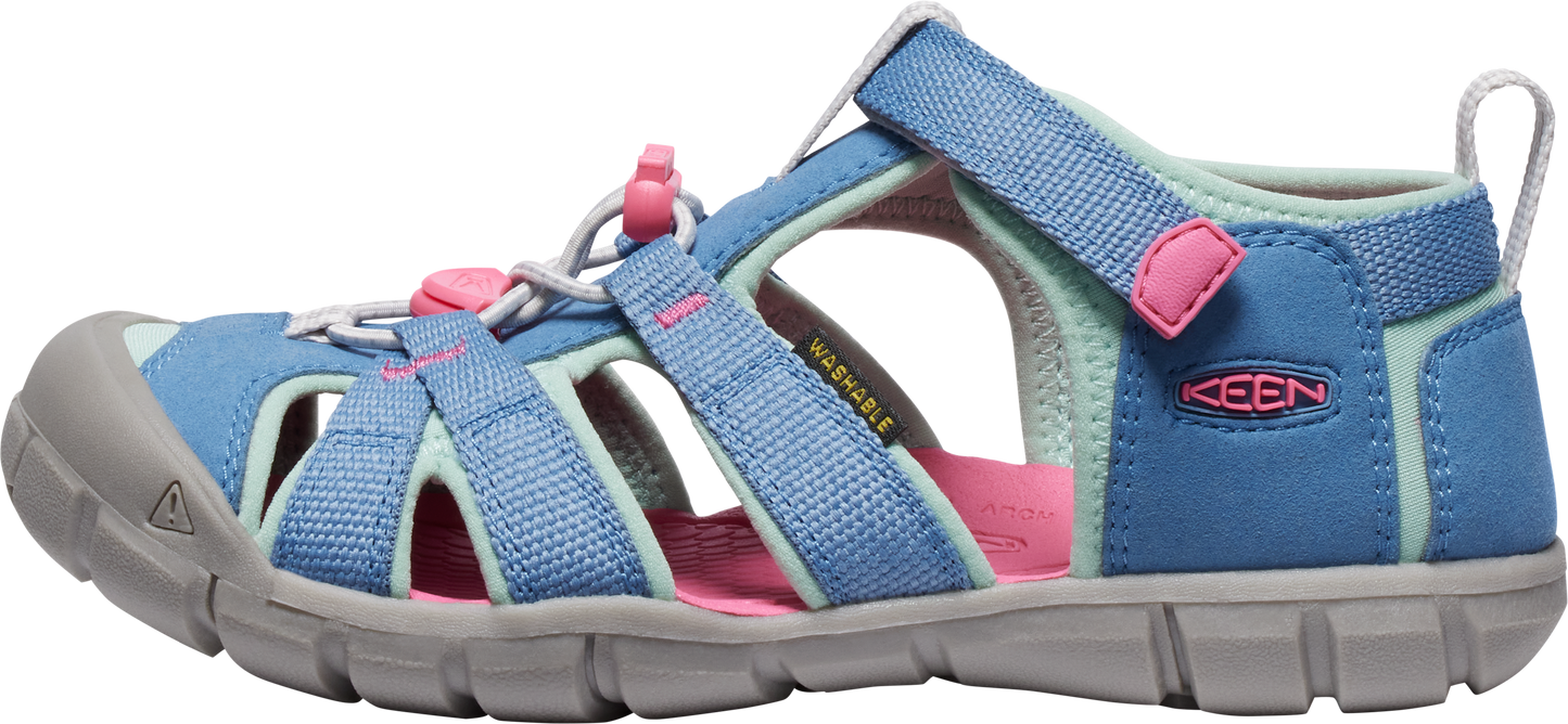 A blue and pink sandal.