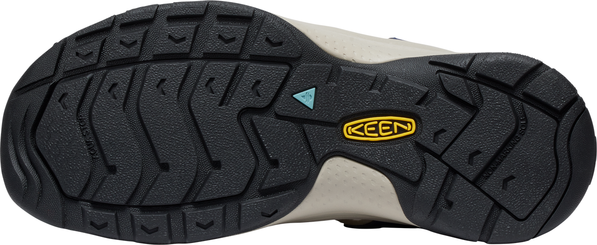 A shoe sole with treads.