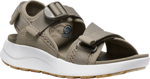 A khaki-colored sandal with hook-and-loop straps and a white, cushioned sole.
