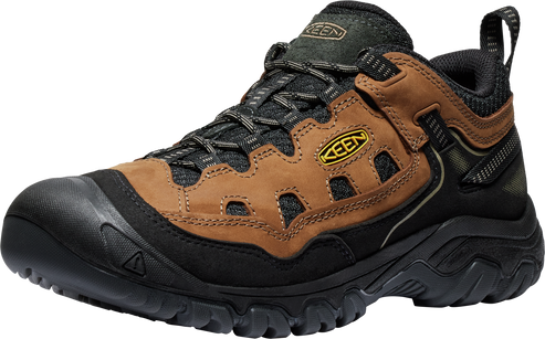 Hiking shoe with brown leather overlays and black synthetic trim and outsole.