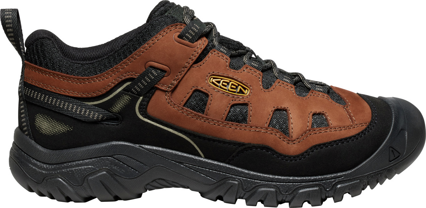 A shoe with brown and black accents.