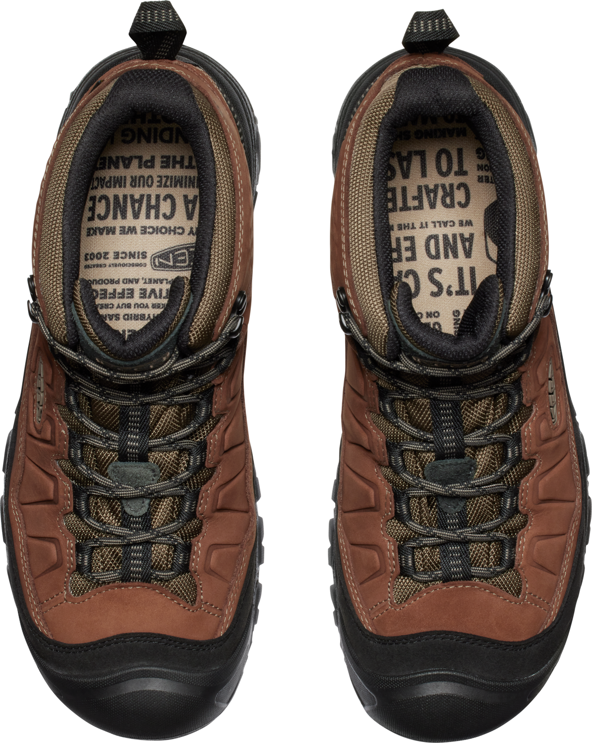 Top-down view of a pair of brown and olive hiking boots with black soles and laces.