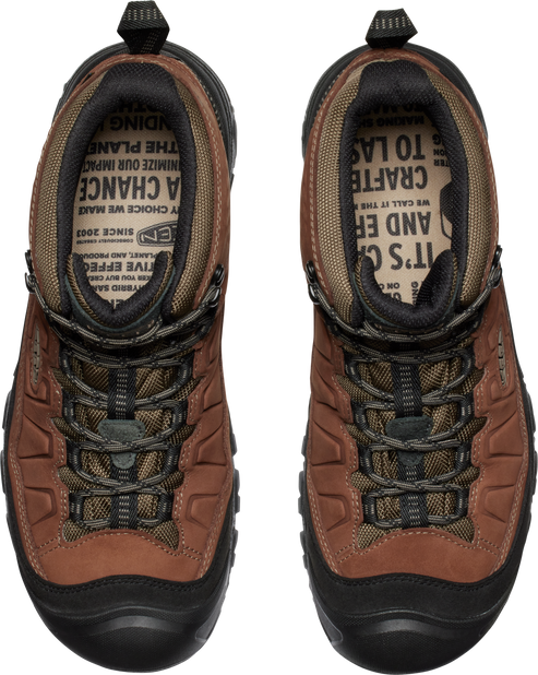 Top-down view of a pair of brown and olive hiking boots with black soles and laces.