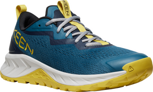 Blue sneaker with yellow accents, white midsole, and gray laces.