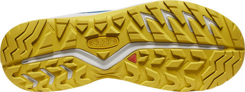 A shoe outsole with a yellow pattern of triangles.