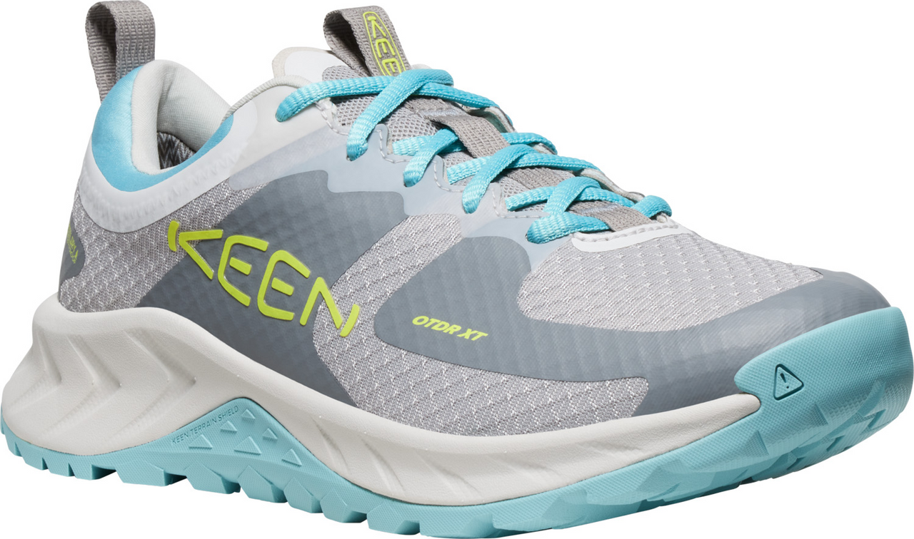 Gray and white athletic shoe with turquoise accents and KEEN on the side.
