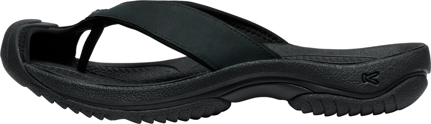 A black flip-flop sandal.