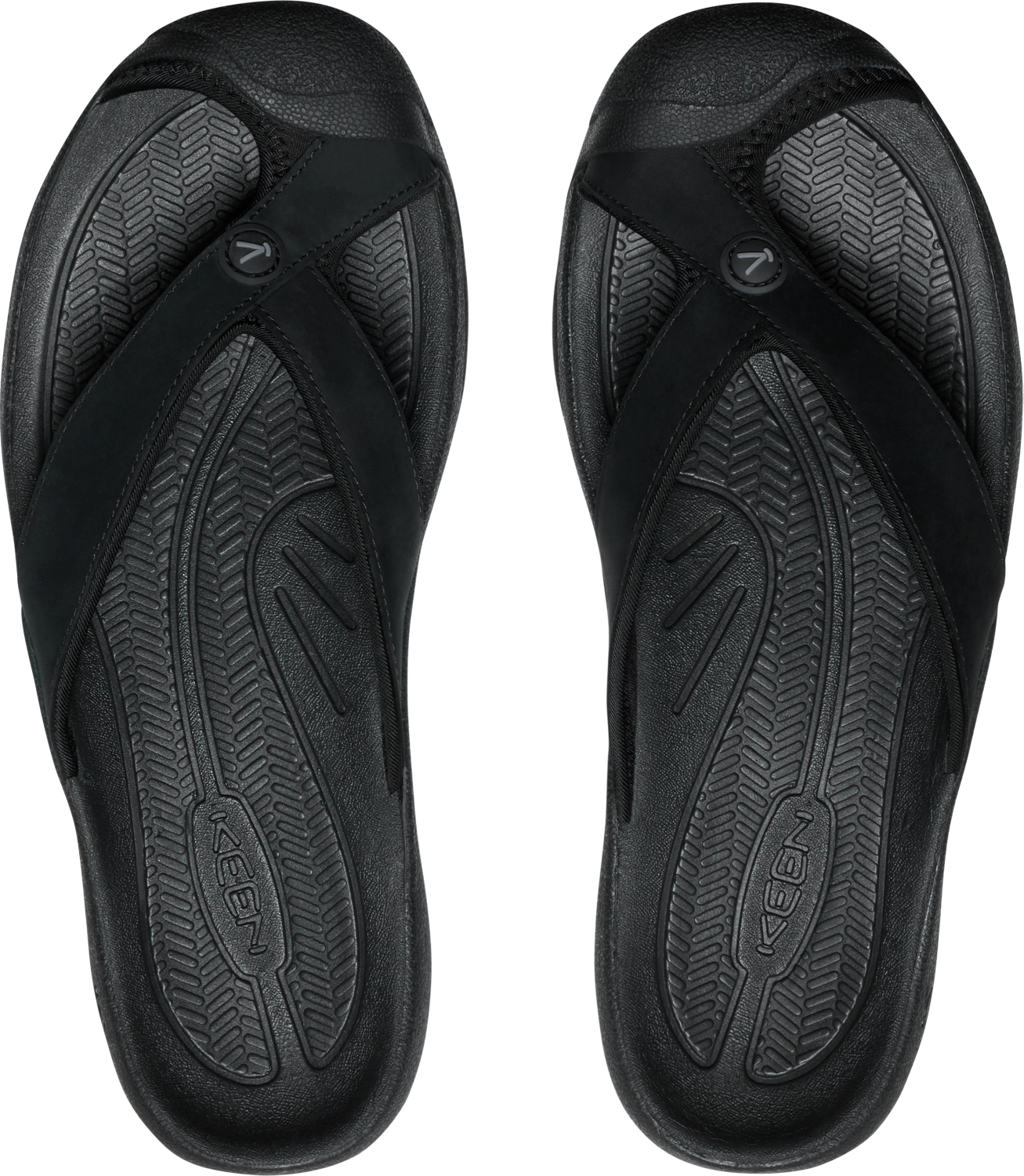 Pair of black flip-flops with textured soles and cross-strap design.
