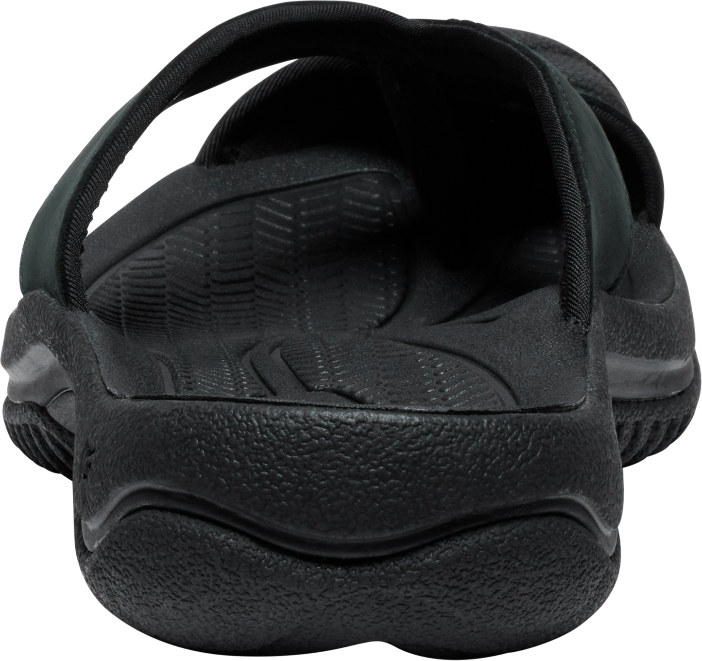 Close-up of a black sandal with a textured footbed and thick sole.