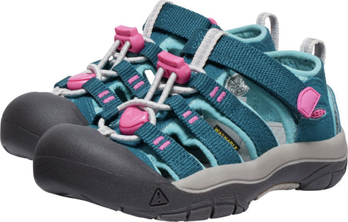 A pair of teal children's water sandals with pink accents and gray soles, featuring a closed toe design and adjustable straps.