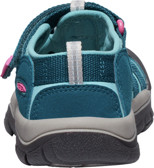Back view of a teal and gray sandal with a velcro strap.