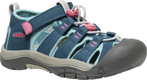 Blue and teal sandal with a gray sole, toe bumper, adjustable straps, and pink accents.