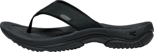 A black flip-flop sandal with a thick sole and a strap featuring a small logo.
