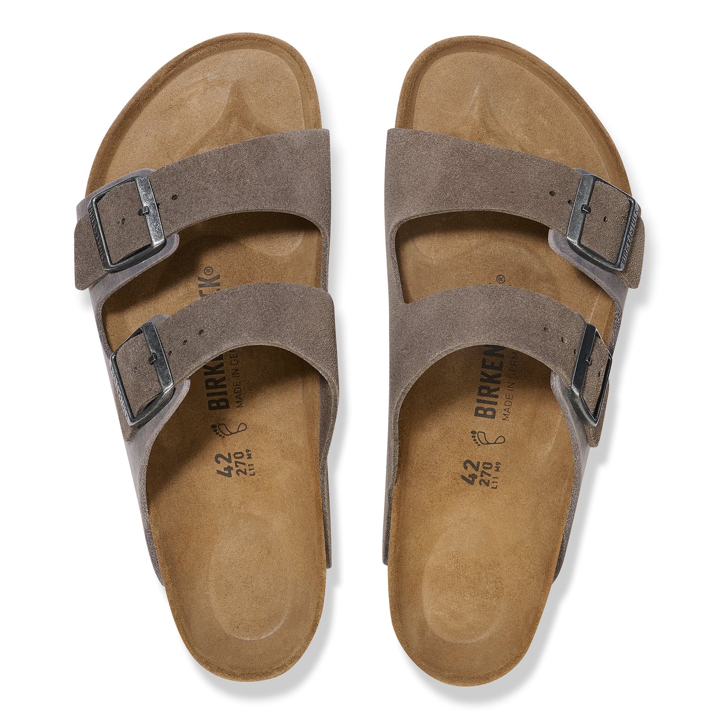 Two-strap slide sandals in taupe with adjustable buckles.