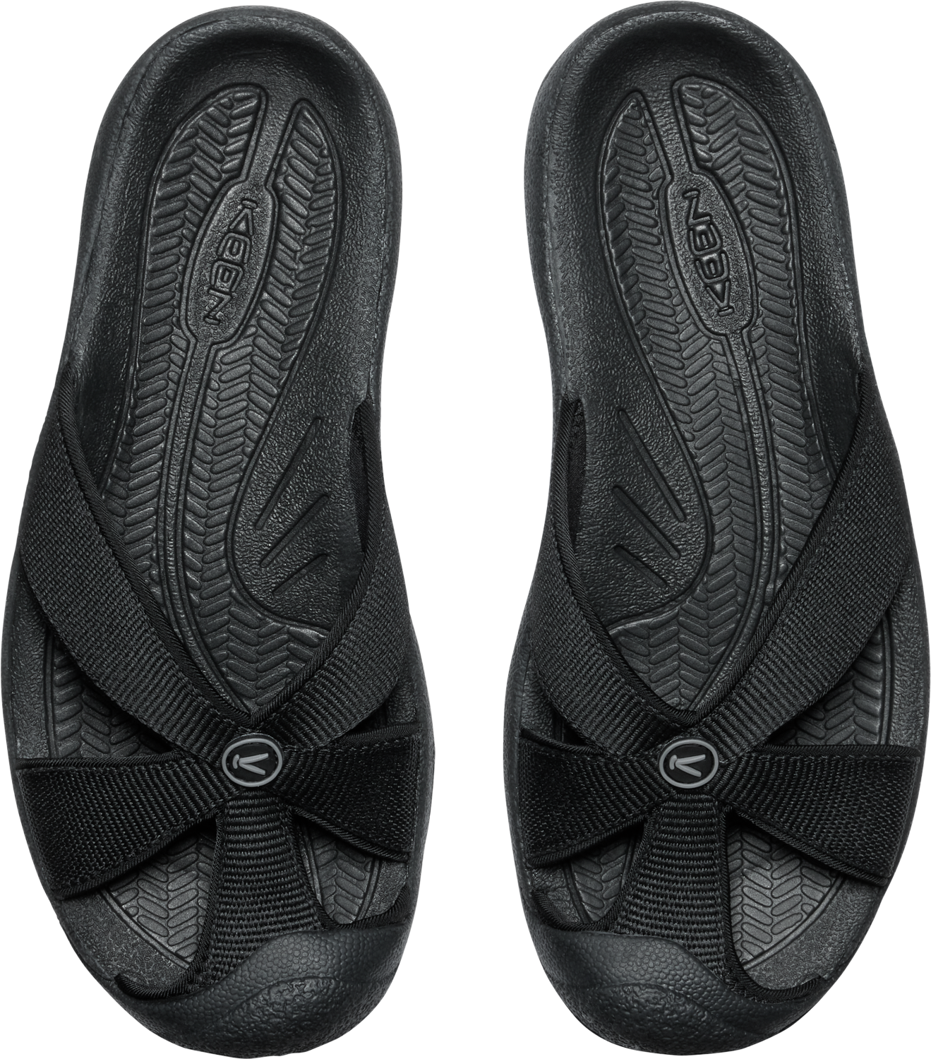 Overhead view of two black sandals with crisscrossing straps.