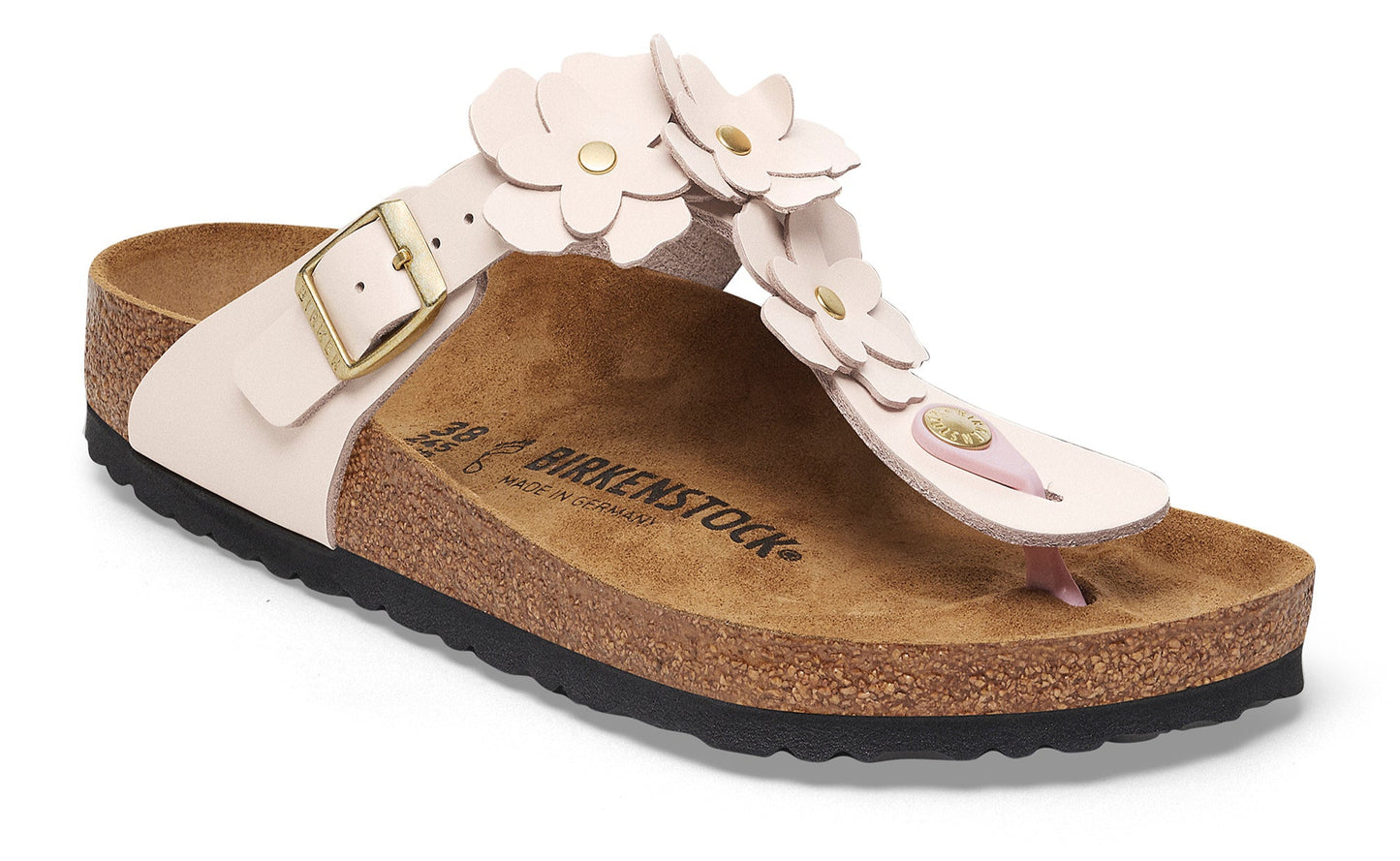 Light pink sandal with toe post, cork footbed and floral strap decorations.