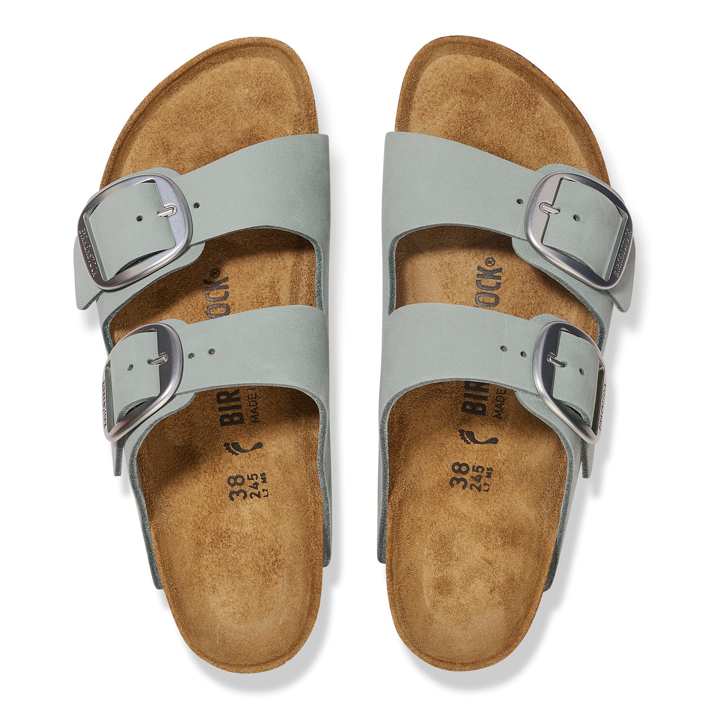 Overhead view of two light gray slide sandals with adjustable silver buckles.