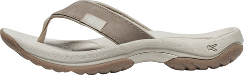 A flip-flop sandal with a beige strap.