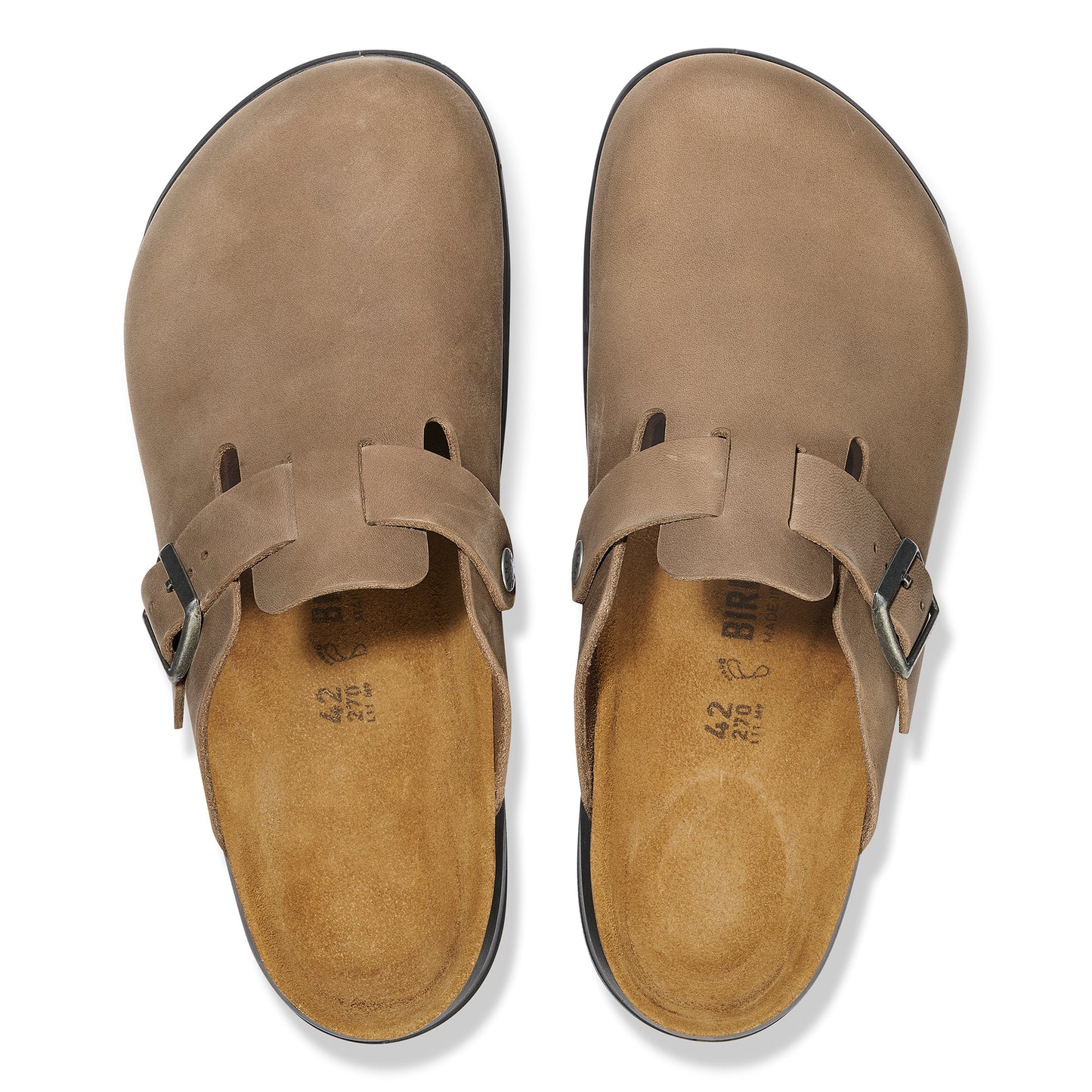 Pair of taupe-colored leather clogs with adjustable straps and buckles.