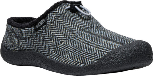 Slip-on shoe with a gray and white herringbone pattern and black sole.