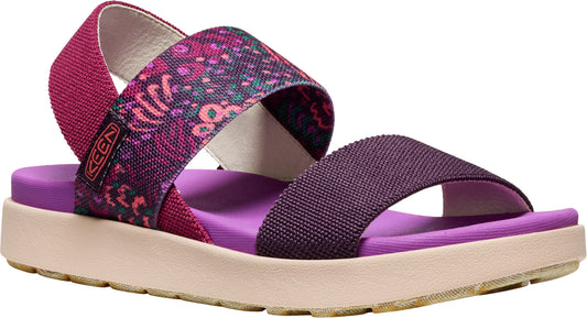 A woman's sandal with a purple footbed and beige sole has two elastic straps in different patterns of purple, fuchsia, teal, and coral.