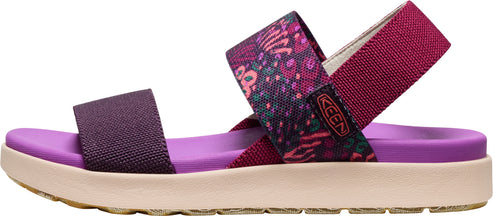 A purple and magenta sandal with floral details.