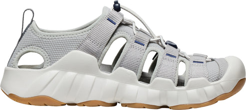 A gray sport sandal with a thick, white sole and brown tread.