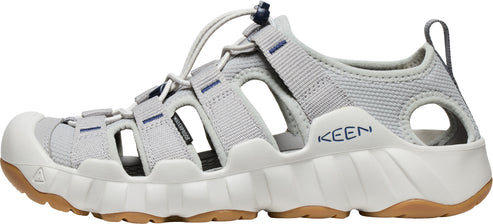 A gray KEEN sandal with a white sole.