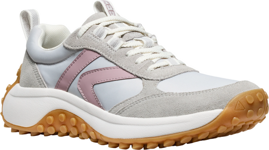 A white sneaker with a grey suede trim, pink stripes on the side, a brown rubber sole, and white laces.