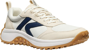 Low top cream colored shoe with a navy stripe and a lug sole.