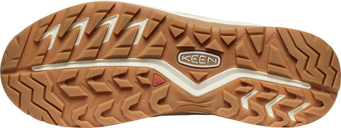 A shoe outsole with a pattern of irregular triangles and a Keen logo in the center.