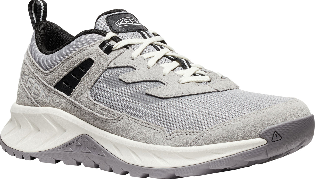 A gray hiking shoe with white laces, a black heel, and a white midsole.