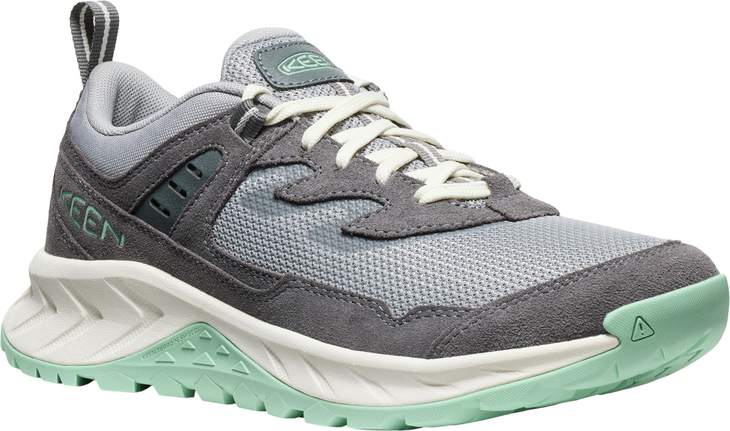 Gray athletic shoe with cream laces, white midsole and mint outsole.