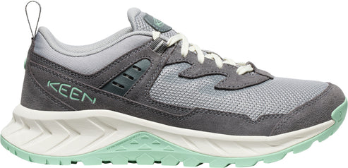 A gray trail shoe with a white midsole and mint-green outsole.