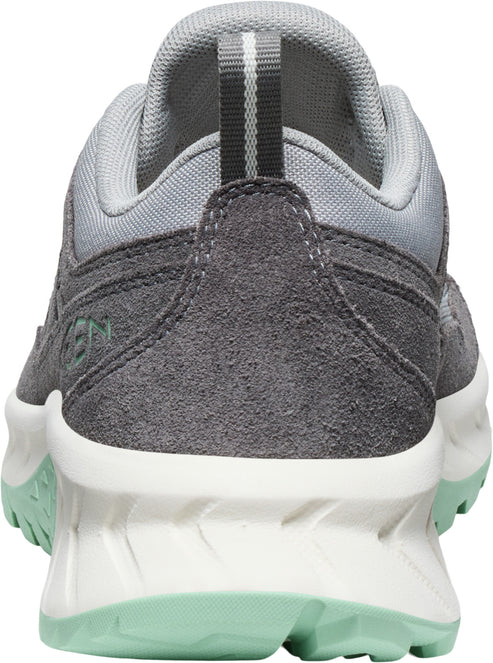 Rear view of a gray suede and fabric shoe with a white and mint sole.