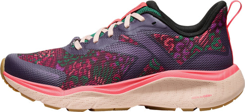 A side view of a purple running shoe with pink and green floral pattern and a pink midsole.