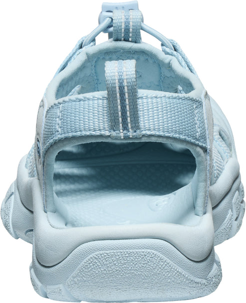 Light blue sandals with toe coverage and a single adjustable strap.