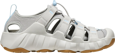 A light gray, open-toed sandal with a thick, white midsole and brown outsole.