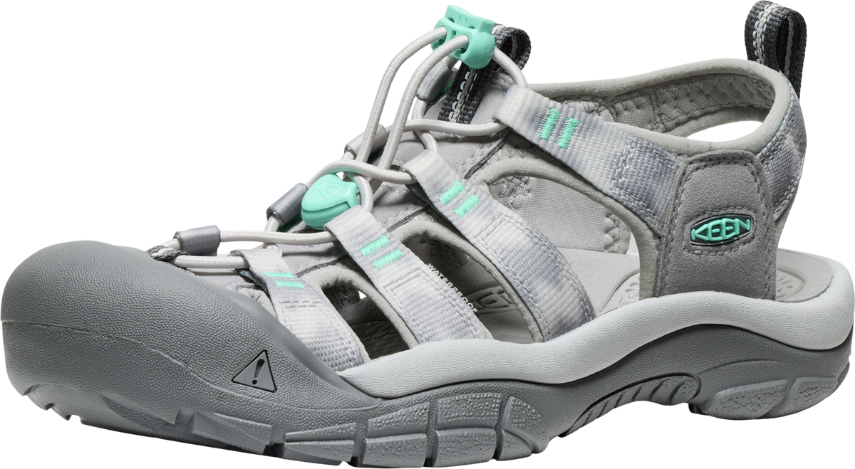Grey sandal with teal accents, toe protection, and adjustable straps.