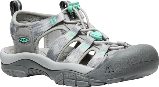Gray sandal with a closed toe and teal accents.