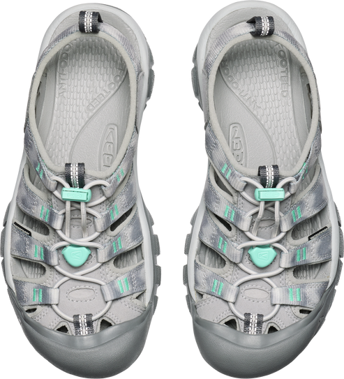 Pair of grey water sandals with aqua accents.