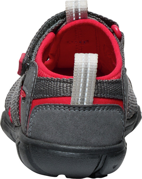 Rear view of a gray and red child's sandal with a velcro strap.