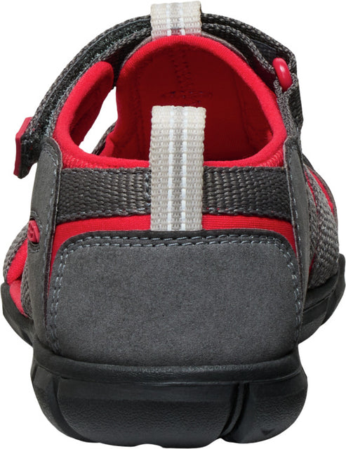 Gray and red child's sandal with velcro strap, rear view.