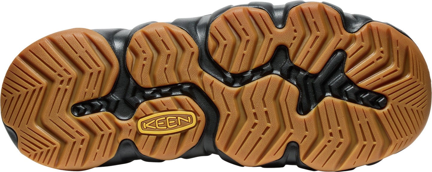 A brown rubber sole with a black frame and the KEEN logo in the center.