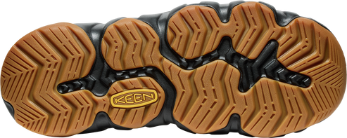 A brown rubber sole with a black frame and the KEEN logo in the center.