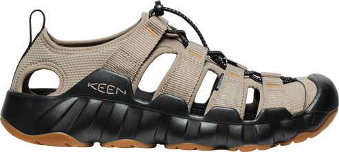 A sandal with a brown upper, a black midsole, and a brown sole.