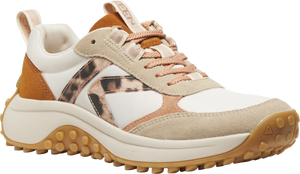 A tan and white sneaker with leopard print detailing.
