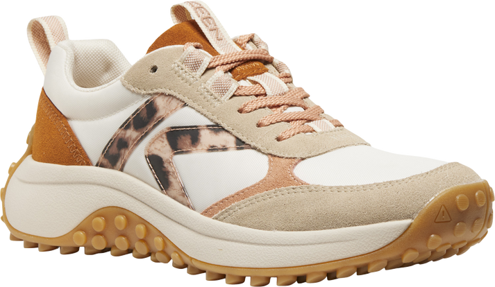 A tan and white sneaker with leopard print detailing.
